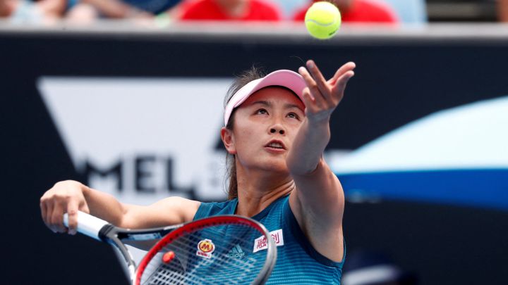 Chinese tennis player Peng Shuai serves during her match against Canadian Eugenie Bouchard at the Australian Open 2019.