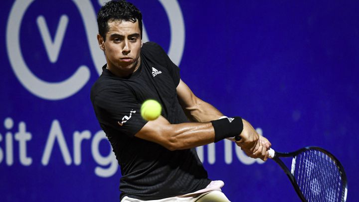 Spanish tennis player Jaume Munar returns a ball during his match against Diego Schwartzman at the Argentina Open in Buenos Aires.