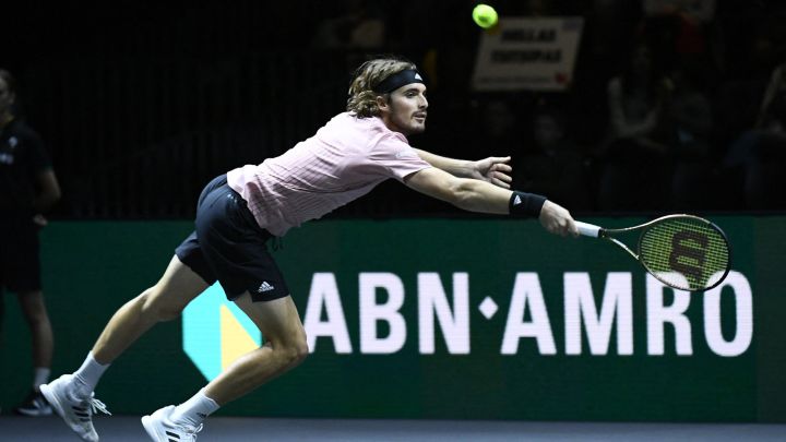 Greek tennis player Stefanos Tsitsipas returns a ball during his match against Jiri Lehecka in the semifinals of the Rotterdam Tournament.