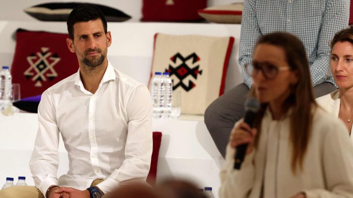 Serbian Tennis player Novak Djokovic (L) looks on during a visit to the Serbian pavillion at the Expo 2020 in Dubai, on February 17, 2022. (Photo by AFP)