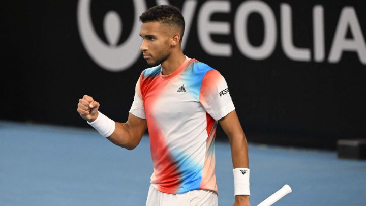 Felix Auger-Aliassime of Canada celebrates after winning his quarter final tennis match against Ilya Ivashka of Belarus (unseen) during the ATP Open 13 in Marseille, on February 18, 2022. (Photo by Nicolas TUCAT / AFP)