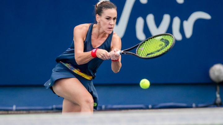 SpainxB4s Nuria Parrizas-Diaz returns the ball to SpainxB4s Sara Sorribes (out of frame) during their WTA Open quarterfinal singles match in Monterrey, Nuevo Leon state, Mexico, on March 4, 2022. (Photo by Julio Cesar AGUILAR / AFP)