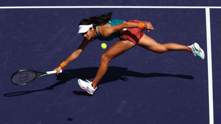 INDIAN WELLS, CALIFORNIA - MARCH 13: Emma Raducanu of Great Britain plays a forehand volley against Petra Martic of Croatia in their third round match on Day 7 of the BNP Paribas Open at the Indian Wells Tennis Garden on March 13, 2022 in Indian Wells, California.  == FOR NEWSPAPERS, INTERNET, TELCOS & TELEVISION USE ONLY ==