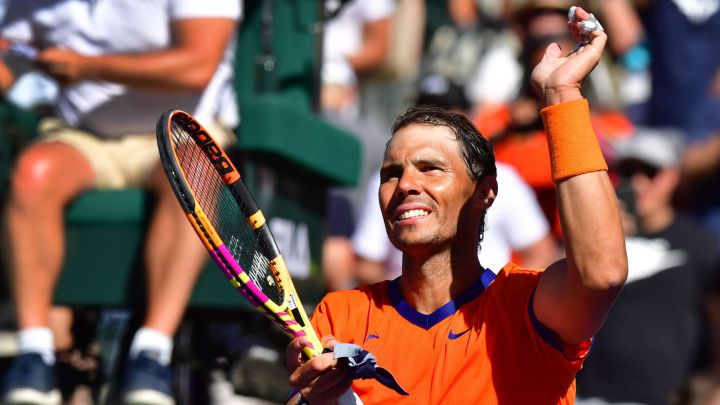 Rafael Nadal of Spain acknowledges fans as he celebrates victory over Daniel Evans of Britain following their round 3 match at the Indian Wells tennis tournament on March 14, 2022 in Indian Wells, California.  - Nadal defeated Evans 7-5, 6-3.  (Photo by Frederic J. BROWN / AFP)