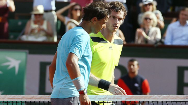 Spanish tennis player Rafa Nadal and Britain's Andy Murray greet each other after their semifinal match at Roland Garros 2014.