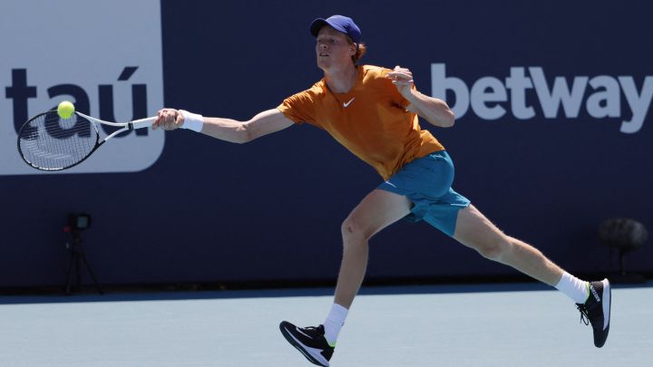 Mar 29, 2022;  Miami Gardens, FL, USA;  Jannik Sinner (ITA) hits a forehand against Nick Kyrgios (AUS)(not pictured) in a fourth round men's singles match in the Miami Open at Hard Rock Stadium.  Mandatory Credit: Geoff Burke-USA TODAY Sports