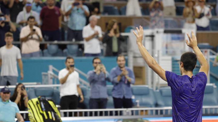 Mar 31, 2022;  Miami Gardens, FL, USA;  Carlos Alcaraz (ESP) salutes the crowd after his match against Miomir Kecmanovic (SRB) (not pictured) in a men's singles quarterfinal in the Miami Open at Hard Rock Stadium.  Mandatory Credit: Geoff Burke-USA TODAY Sports