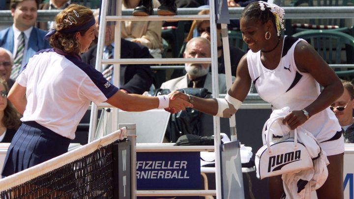 American tennis player Serena Williams greets Spain's Arantxa Sanchez Vicario after retiring from the 1999 Berlin Tournament.