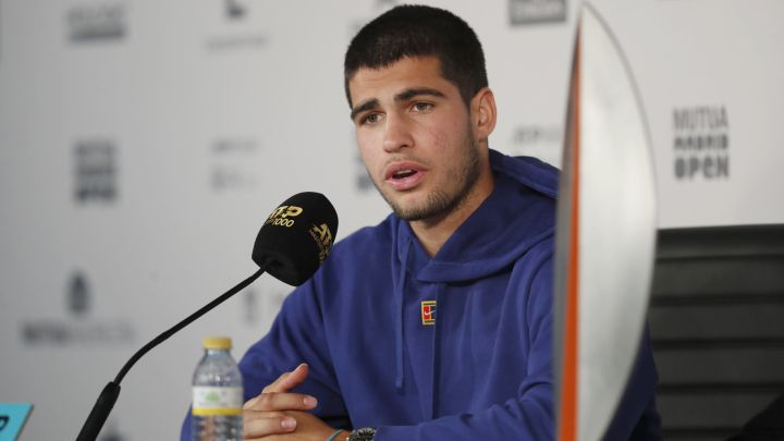 Spanish tennis player Carlos Alcaraz speaks at a press conference after winning the title at the Mutua Madrid Open after beating Alexander Zverev in the final of the tournament.