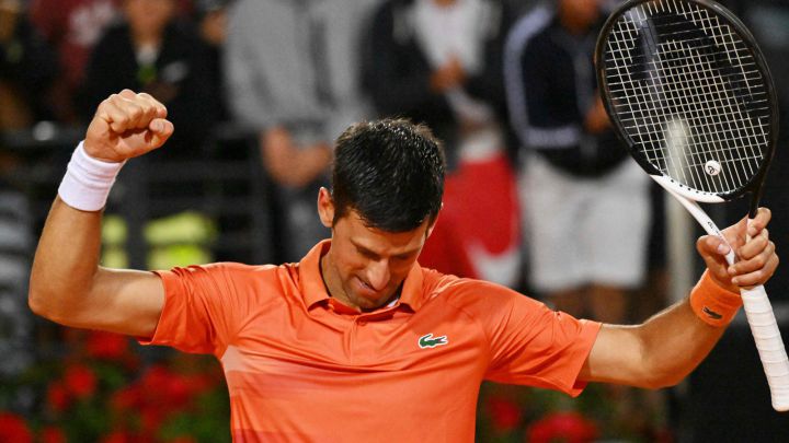 Serbia's Novak Djokovic celebrates after defeating Norway's Casper Ruud during their semifinal match at the ATP Rome Open tennis tournament on May 14, 2022 at Foro Italico in Rome.  (Photo by Andreas SOLARO / AFP)