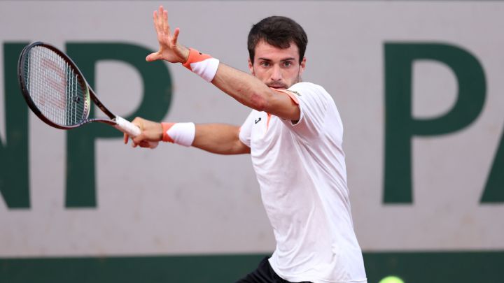 PARIS, FRANCE - MAY 23: Pedro Martinez of Spain plays a forehand against Henri Laaksonen of Switzerland during the Men's Singes First Round match on Day 2 of The 2022 French Open at Roland Garros on May 23, 2022 in Paris, France.  (Photo by Ryan Pierse/Getty Images)