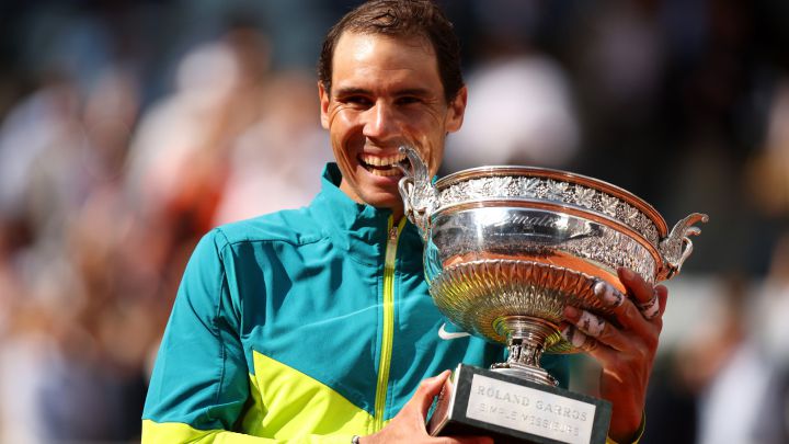 PARIS, FRANCE - JUNE 05: Rafael Nadal of Spain celebrates with the trophy after winning against Casper Ruud of Norway during the Men\'s Singles Final match on Day 15 of The 2022 French Open at Roland Garros on June 05, 2022 in Paris, France. (Photo by Adam Pretty/Getty Images)