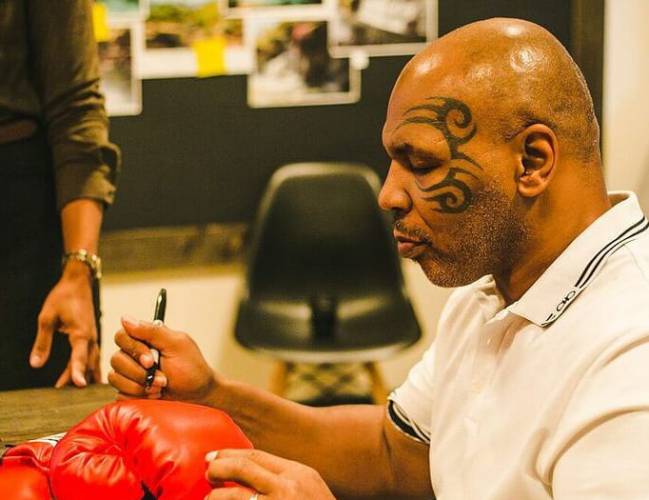 Mike Tyson Mao tattoo what does it mean and why did he get it?