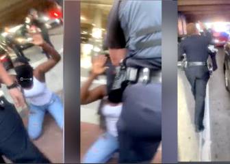 La aplaudida defensa de una policía afroamericana a una manifestante de rodillas