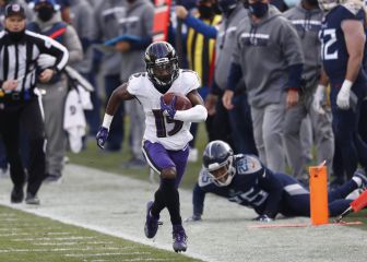 Ravens retiene a Henry; Lamar gana su primer juego de playoff