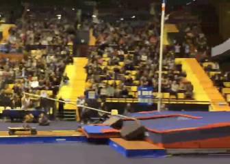 Surreal pole vault jump with the aid of a skateboard