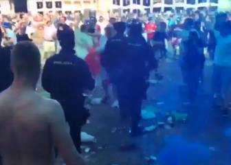 Leicester fans throw cans and bottles as riot police move in