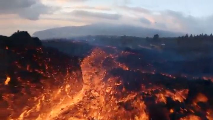 La Palma volcano eruption: drone flies low over rivers of lava